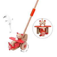 Wooden musical push toy - a bear with an airplane